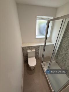Toilet And Shelving 