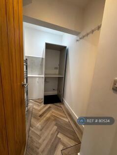 Utility/ Coat Storage And Lower Toilet And Sink 