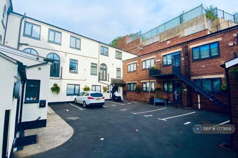 Redbrick Building On The Right