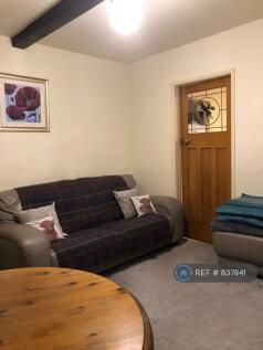 Living Room Sofa And Door To Kitchen