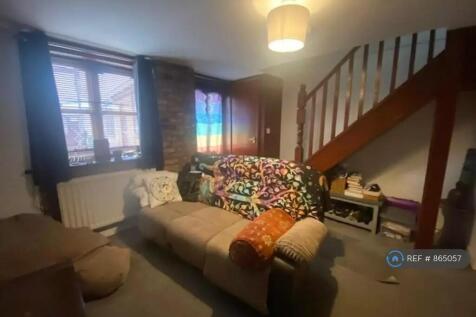 Front Room With Tenants Furniture