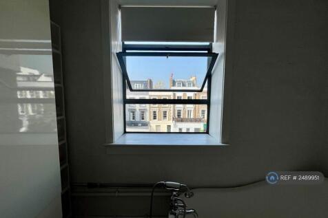 Double Windows Overlooking Quiet Street