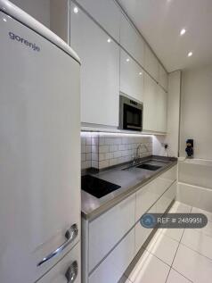 Modern Kitchen With Stainless Worktops