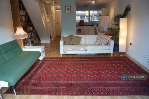 Living Room Opening Onto Decked Garden 