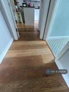 Wooden Floors Through The Living Space 