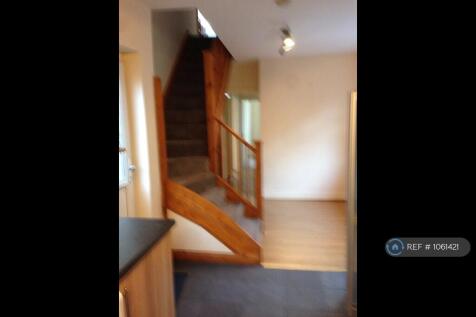 Dinning Area With Stairs To Large Attic Room