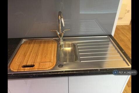 Designer Sink With Integrated Chopping Board