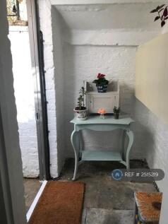 Boot Room. Leads From Bedroom Out To Patio