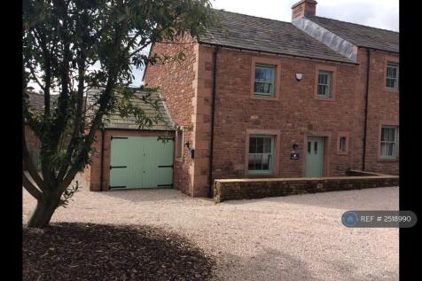 Front View Of Garage And Private Parking