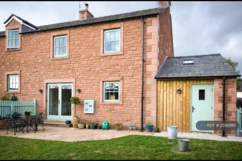 Rear View Of Sandstone Terrace And Shed