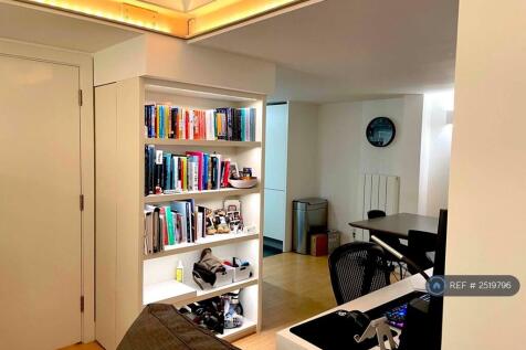 Bookshelf With Hidden Storage