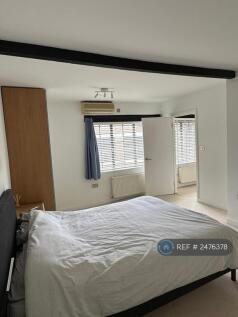 Bedroom 1 With Large Windows And Fitted Wardrobe