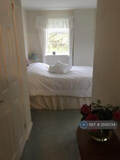 View Down Corridor To Bedroom