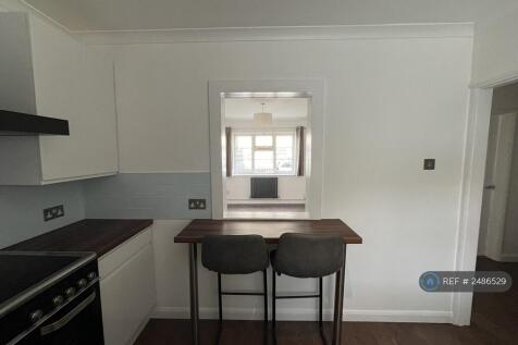 Kitchen With Breakfast Bar Into Living Room