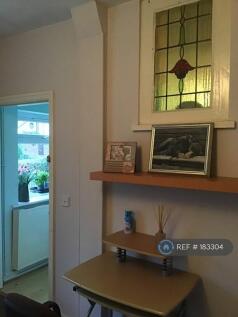 Desk And From Entrance To Room