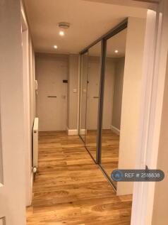 Sliding Door Storage In Hallway