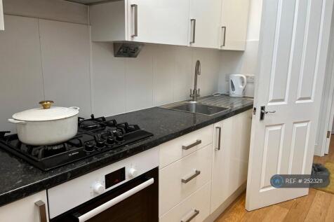 Kitchen Area (Large Fridge, Freezer And Dishwasher