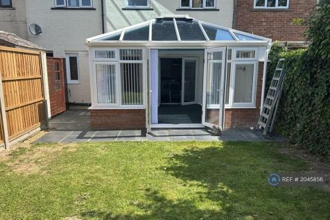 Rear Garden And Conservatory