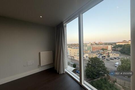 Floor To Ceiling Window With a View