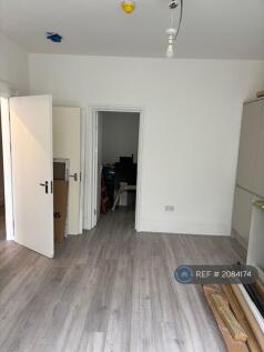 Living And Kitchen Area Leading To Bedroom 