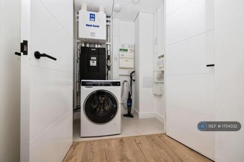 Utility Cupboard With Storage Area