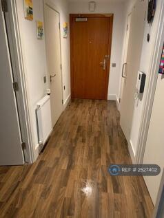 Corridor With Storage &amp; Modern Washing Machine