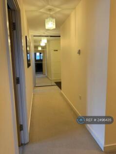 Hallway Leading To Smaller Bedroom &amp; Entrance