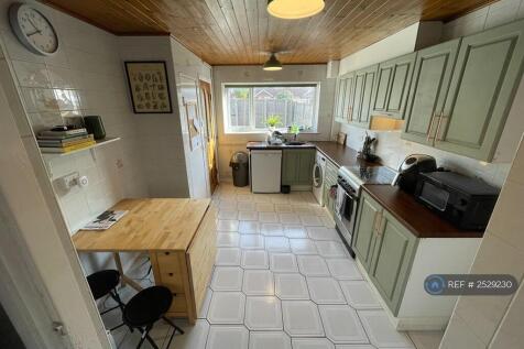 Kitchen And Communal Dining Room