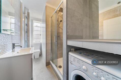 Bathroom With Washing Machine