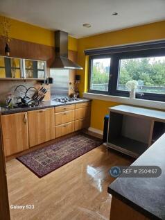 Open Plan Kitchen With Integrated White Goods