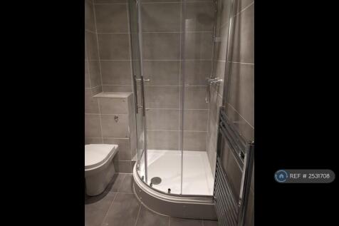 Porcelain Tiled Shower And Vanity Unit