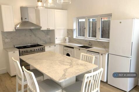 Full Size Island With Seating At Three Sides