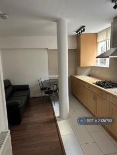 Open Plan Lounge With Kitchen