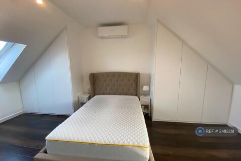 Master Bedroom With Built-In Cupboards