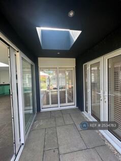 Covered Patio Between Family Room &amp; Kitchen