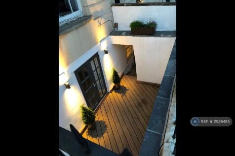 Decked Patio/Courtyard At Front