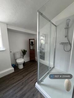 Shared Bathroomwith Shower And Storage 