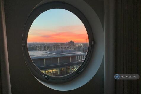 Sunset Through Round Window
