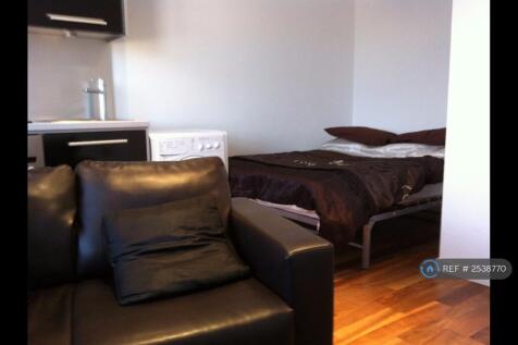 Studio Apartment, So Bed Tucked Away In One Corner