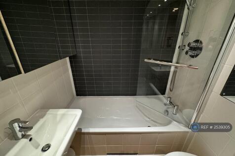 Bathroom With Bath &amp; Shower, Mirrored Cupboards