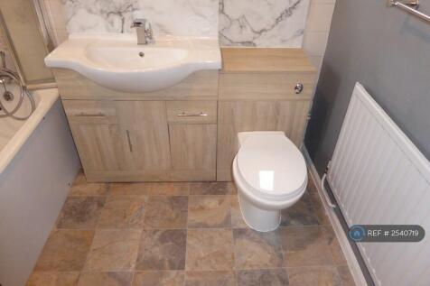 Main Bathroom With Bath And Shower.