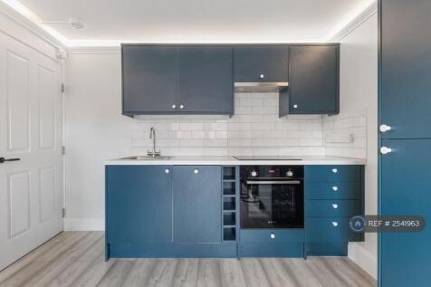 Kitchen With Dishwasher And Induction Hob