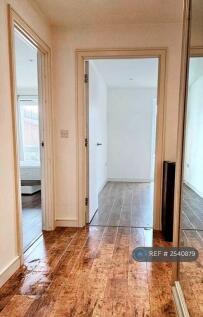 Large Hallway With Walk-In Storage Cupboards
