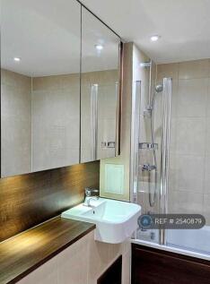 Main Bathroom With Large Cupboards