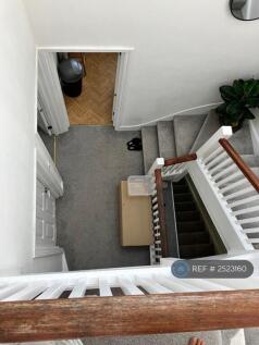 View Of Hall Way Looking Down From Top Bedroom