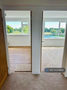 Hallway View With Lounge And Bedroom 1 Doorways