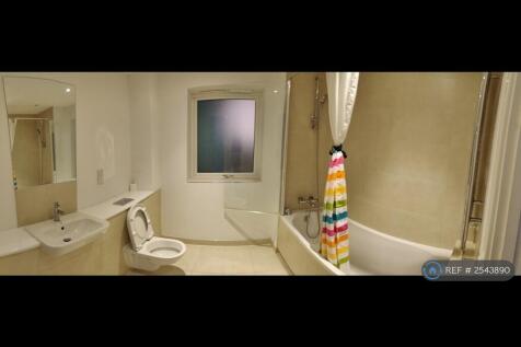 Family Bathroom With Bath Tub