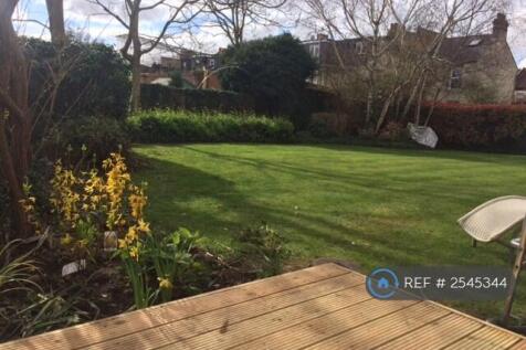 Garden Leading Out Onto Decking From Living Room