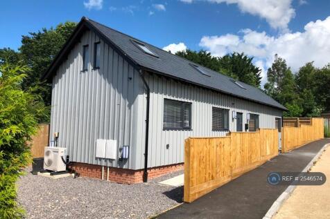 Dove House Has a Gated Driveway And Parking Space