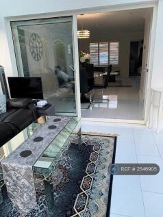 View From Conservatory Into Main Living/Dining 